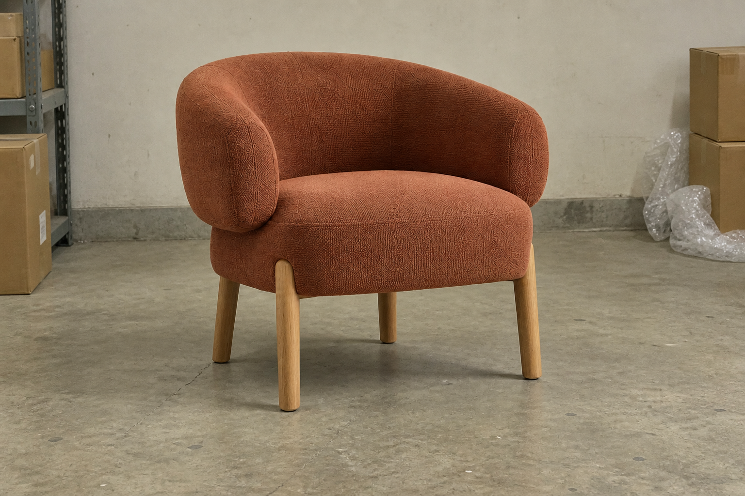 Illustrative terracotta accent chair poorly lit stockroom snapshot